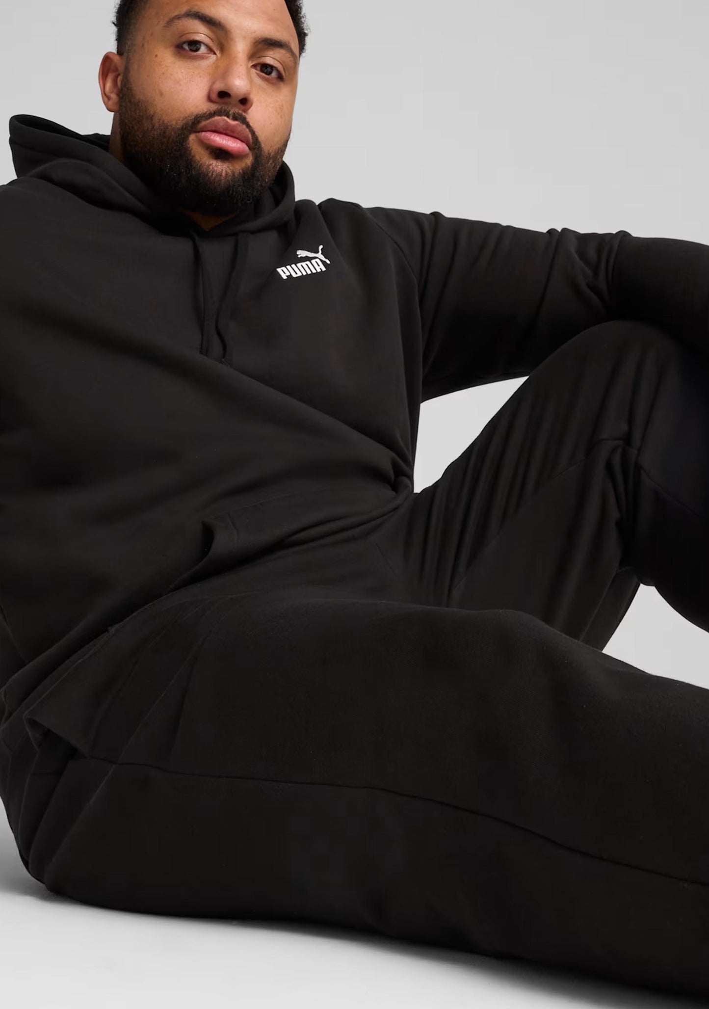 Puma Men's ESS Logo Open Hem Sweatpants Black