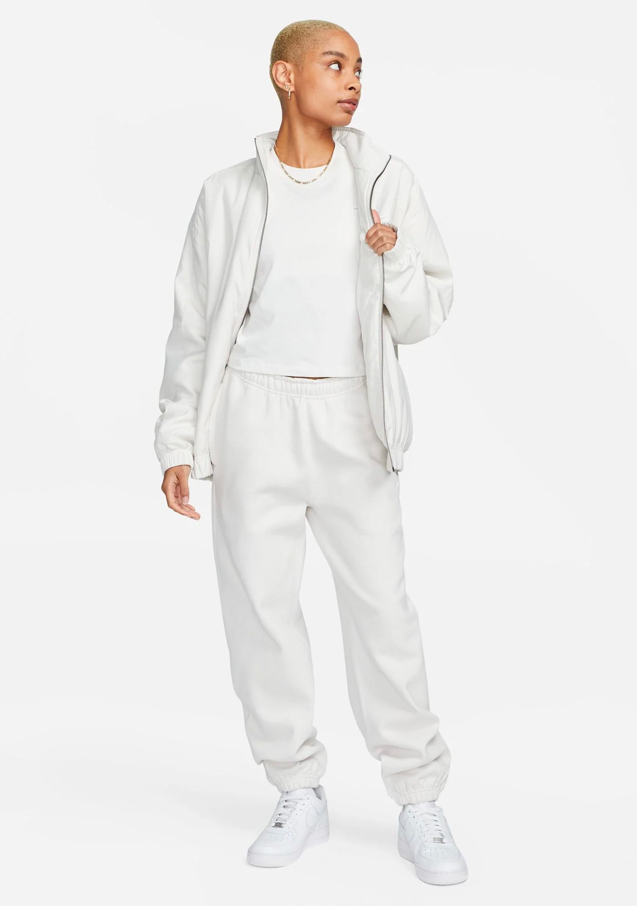 Nike Women s Solo Swoosh Fleece Sweatpants Light Grey CW5565 051
