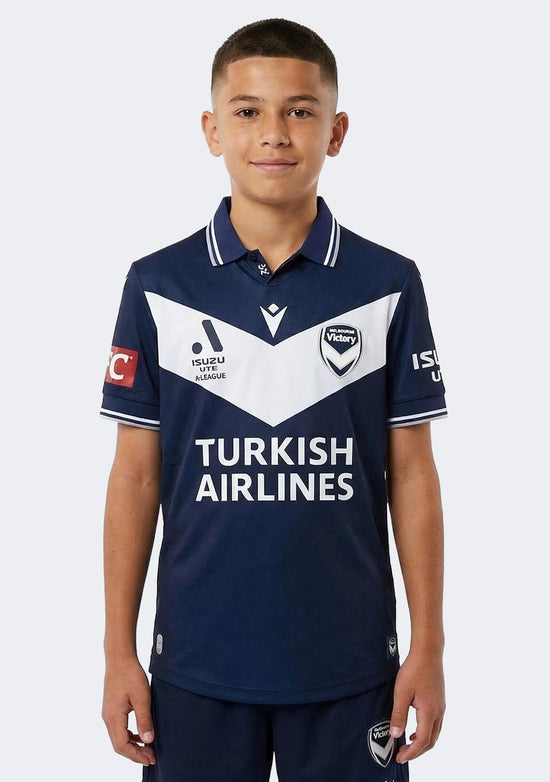 Macron Kids' Melbourne Victory M24/25 ALM Authentic Short Sleeve Home Jersey