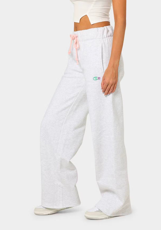 Champion Women's Reverse Weave Daisies Puddle Track Pants