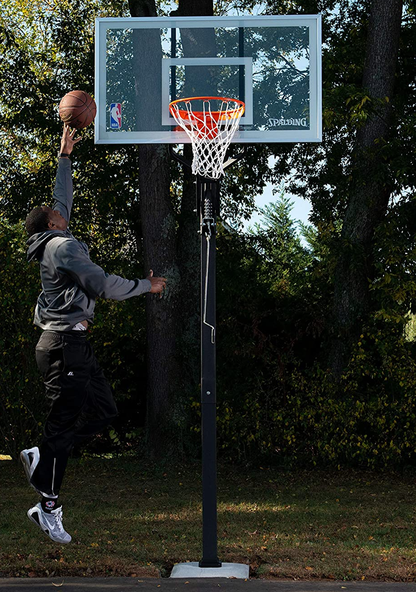 Spalding U-Turn Pro™ 54 Inch Glass (137 cm) in Ground Basketball System <br> AA881005